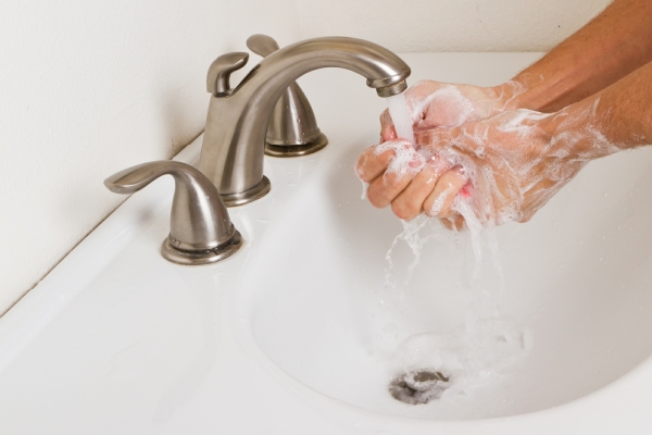 Person washing their hands