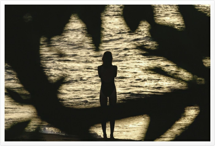 Woman with a fear of bathing near the seaside